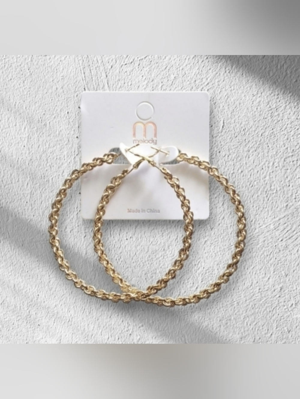 Twisted Hoop Earrings by Melody
